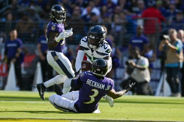 Seattle Seahawks cornerback Riq Woolen (27) breaks top a pass intended for Baltimore Ravens wide receiver Odell Beckham Jr. (3) during the first half at M&T Bank Stadium.